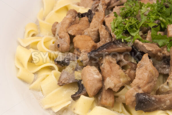 Geschnetzeltes in Bier-Rahm-Sauce mit Pasta Detail - Fotos-Schmiede